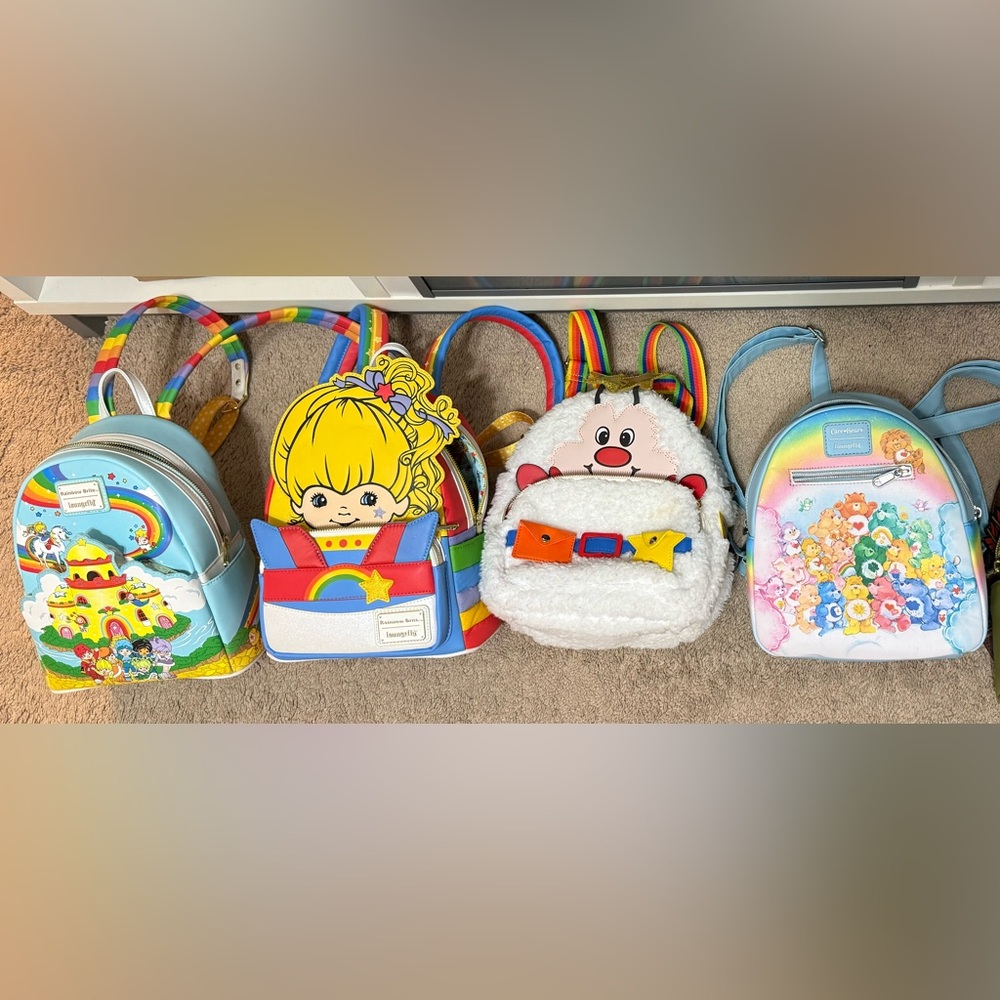 Multiple loungefly mini backpacks like new -each one is $40